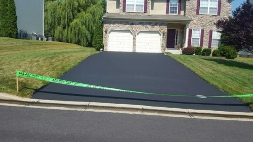 Seal Coating in Harford County Photo - Colonial Home with Stone with Great Seal Coat Job Done